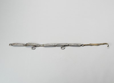 Lot 896 - A TIBETAN LEATHER AND IRON BELT