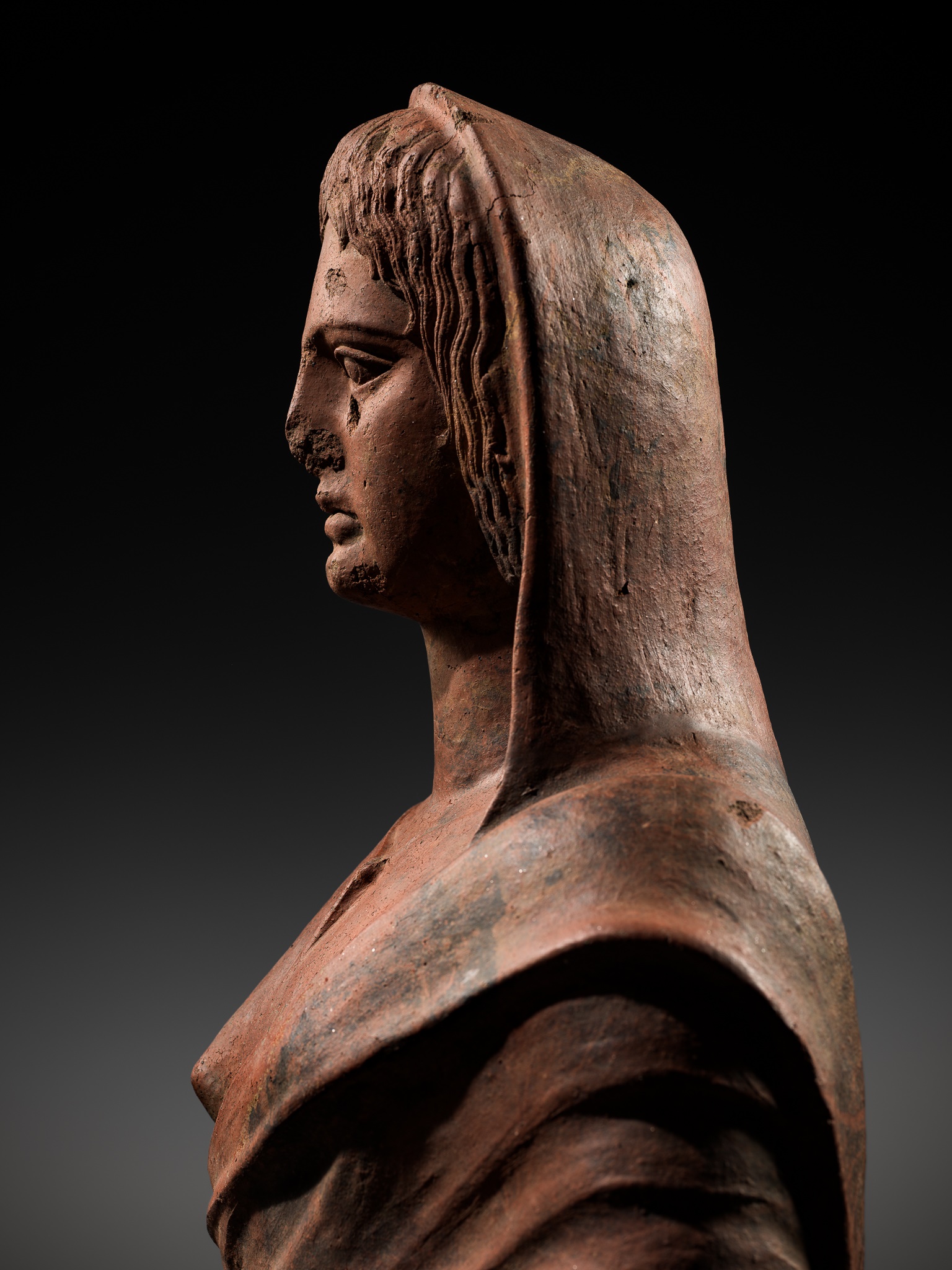 Lot 83 - A LARGE ETRUSCAN TERRACOTTA BUST OF A NOBLE