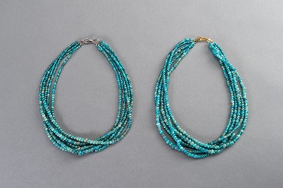Lot 572 - TWO FINE IRRAWADDY GLASS NECKLACES