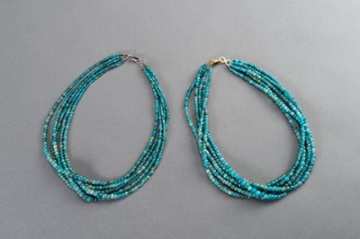 Lot 572 - TWO FINE IRRAWADDY GLASS NECKLACES