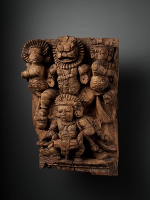 Lot 461 - A TIBETAN WOOD RELIEF WITH WRATHFUL DEITIES, 16TH-18TH CENTURY