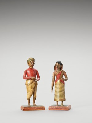 Lot 1247 - A PAIR OF HAND-PAINTED INDIAN WOOD DOLLS, C.1900-1920
