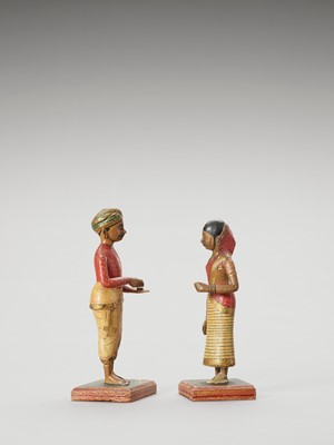 Lot 1247 - A PAIR OF HAND-PAINTED INDIAN WOOD DOLLS, C.1900-1920