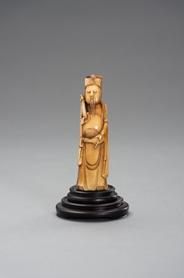 Lot 989 - AN IVORY CARVING OF AN IMMORTAL, MING