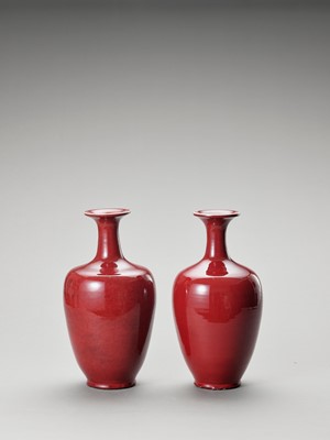 Lot 715 - A PAIR OF LARGE ‘OXBLOOD’ GLAZED BALUSTER VASES, LATE QING
