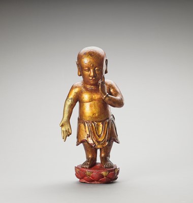 Lot 1195 - A VIETNAMESE GILT-LACQUERED WOOD FIGURE OF BUDDHA AS A CHILD