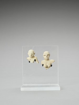 Lot 1157 - THE POTTERY MEHRGARH COUPLE
