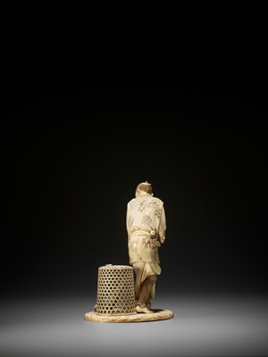 Lot 172 - TOSHIYUKI: AN IVORY OKIMONO OF A MAN SWEEPING AND FEEDING HIS CHICKENS