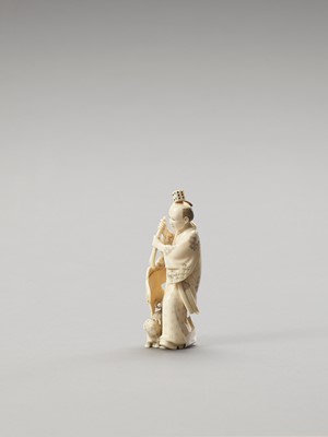 Lot 146 - AN UNUSUAL IVORY OKIMONO OF A MAN AND DOG
