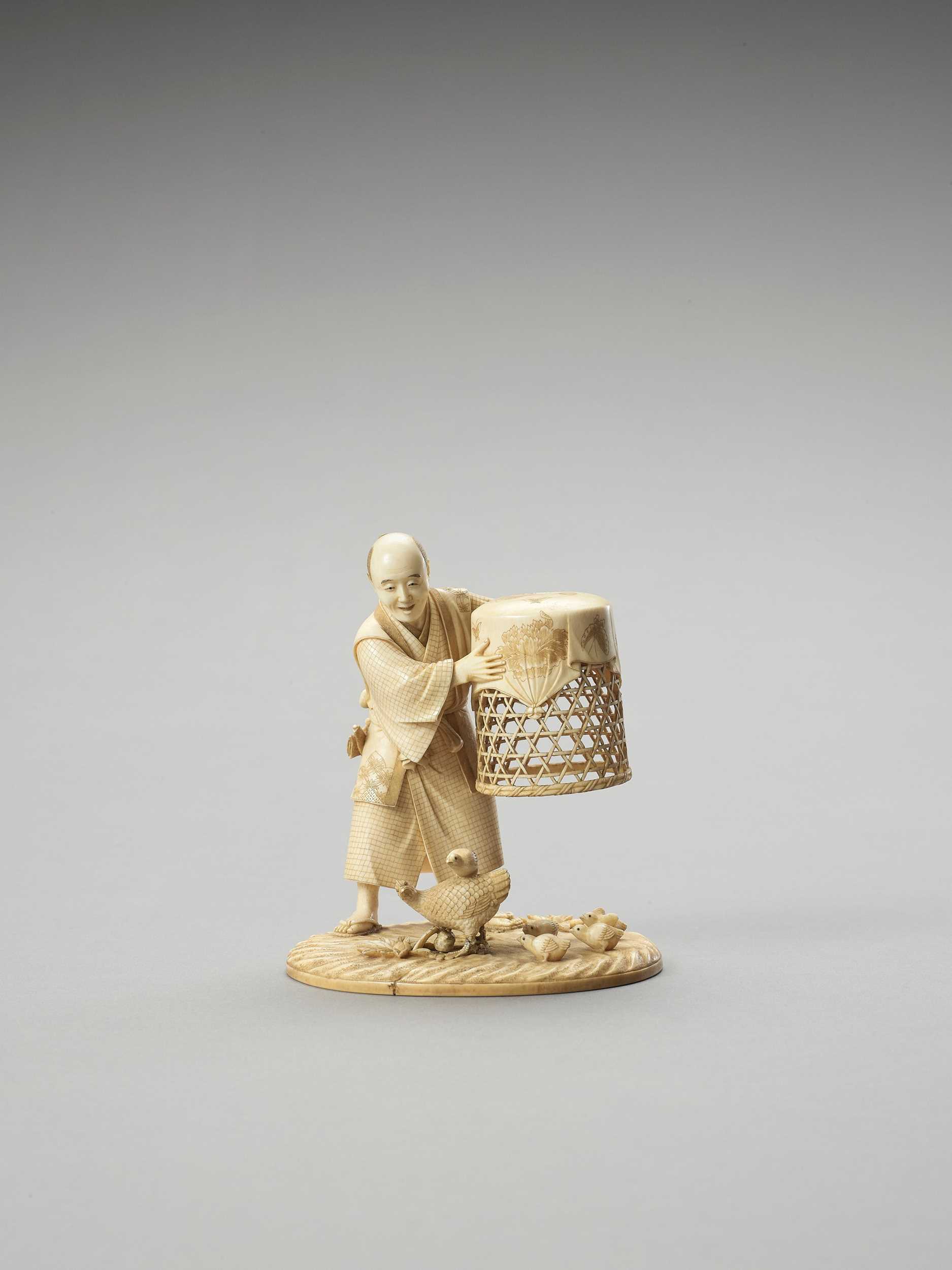 Lot 130 - MUNEHIRO: AN IVORY OKIMONO OF A MAN WITH CHICKENS