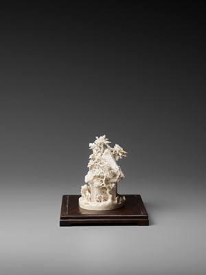 Lot 155 - SANEMASA: A FINE IVORY OKIMONO OF A RICE MILL WITH WORKERS