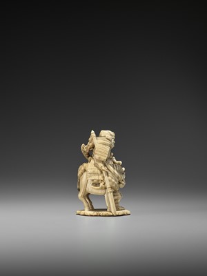 Lot 169 - NOBUTOMO: AN IVORY OKIMONO OF A SAMURAI ON HORSEBACK AND VASSAL