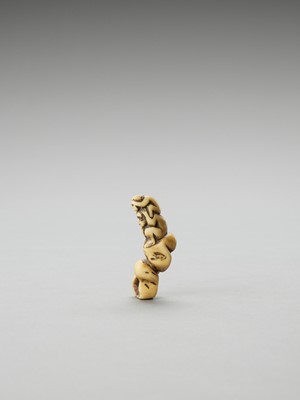 Lot 276 - A STAG ANTLER NETSUKE OF THE THREE WISE MONKEYS
