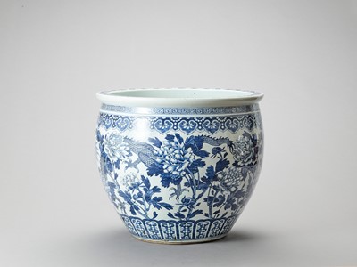 Lot 1139 - A LARGE BLUE AND WHITE PORCELAIN ‘DRAGON’ FISHBOWL
