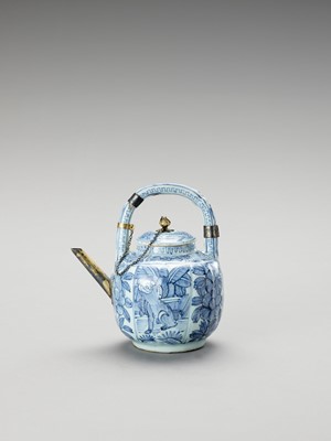 Lot 1086 - A SILVER-MOUNTED BLUE AND WHITE PORCELAIN TEAPOT