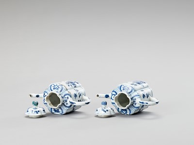 Lot 1098 - A PAIR OF BLUE AND WHITE PORCELAIN TEAPOTS