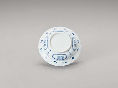 Lot 1099 - A LOBED BLUE AND WHITE PORCELAIN BOWL