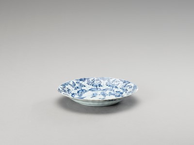 Lot 1109 - A LOBED BLUE AND WHITE PORCELAIN DISH
