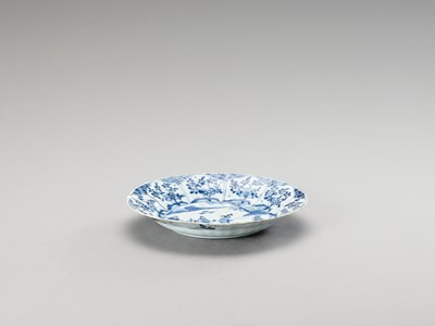 Lot 1109 - A LOBED BLUE AND WHITE PORCELAIN DISH