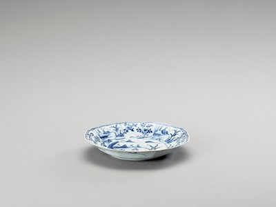 Lot 1113 - A LOBED AND DEEP BLUE AND WHITE PORCELAIN PLATE