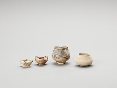 Lot 1160 - FOUR ANTIQUE CERAMIC OIL LAMPS FROM INDUS VALLEY