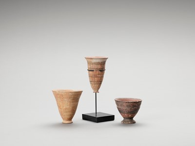 Lot 1161 - THREE CERAMIC MEHRGARH AND HARAPPAN DRINKING CUPS