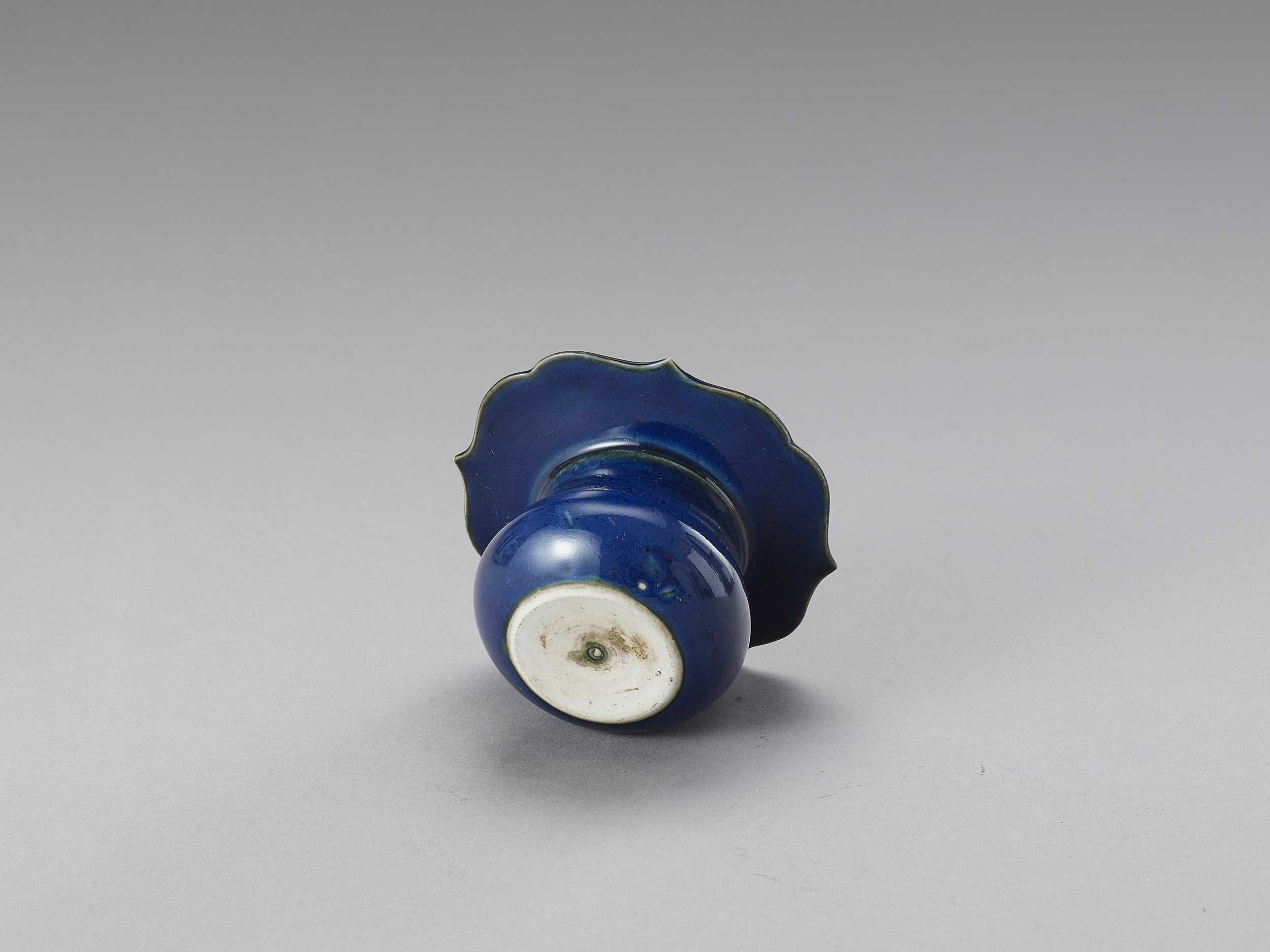 Lot 1150 - A POWDER BLUE INKWELL