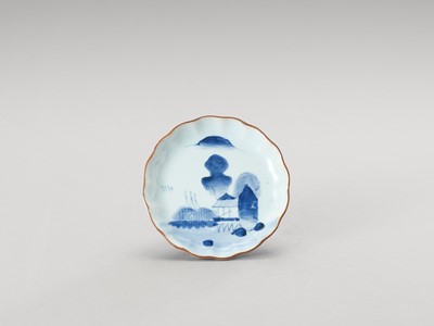 Lot 41 - A SMALL BLUE AND WHITE LOBED PORCELAIN DISH