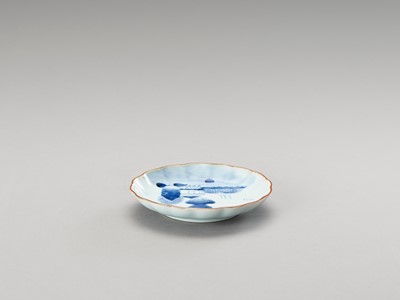 A SMALL BLUE AND WHITE LOBED PORCELAIN DISH