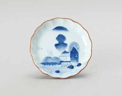 Lot 1218 - A SMALL BLUE AND WHITE LOBED PORCELAIN DISH