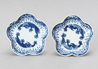 Lot 1219 - A SMALL PAIR OF LOBED BLUE AND WHITE PORCELAIN DISHES