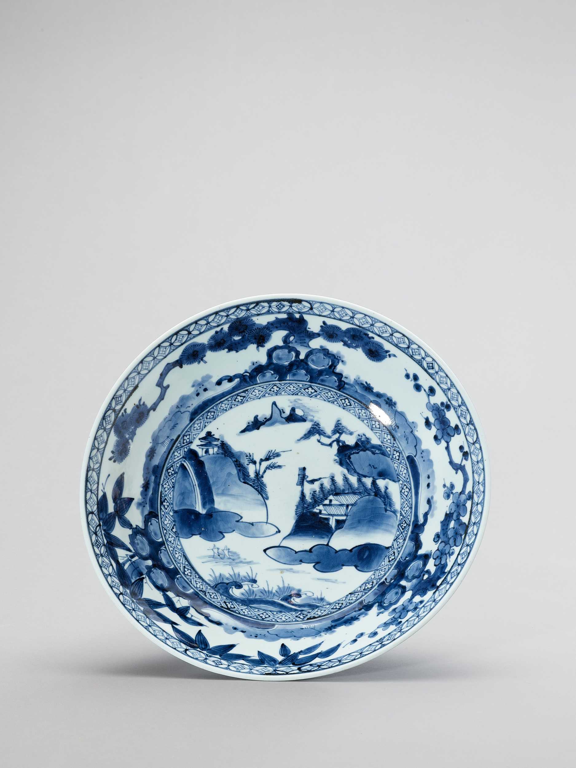 Lot 1014 - A BLUE AND WHITE ARITA PORCELAIN CHARGER