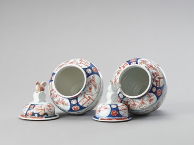Lot 124 - A PAIR OF IMARI PORCELAIN VASES AND COVERS