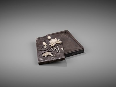 Lot 30 - A DUAN ‘CRANE AND LOTUS’ INKSTONE AND COVER, QING