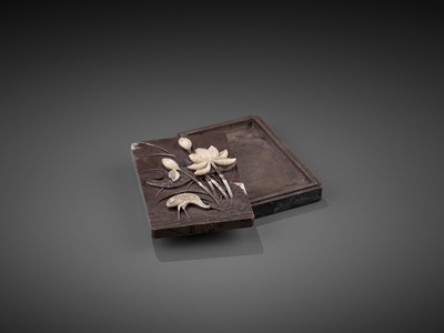 Lot 30 - A DUAN ‘CRANE AND LOTUS’ INKSTONE AND COVER, QING