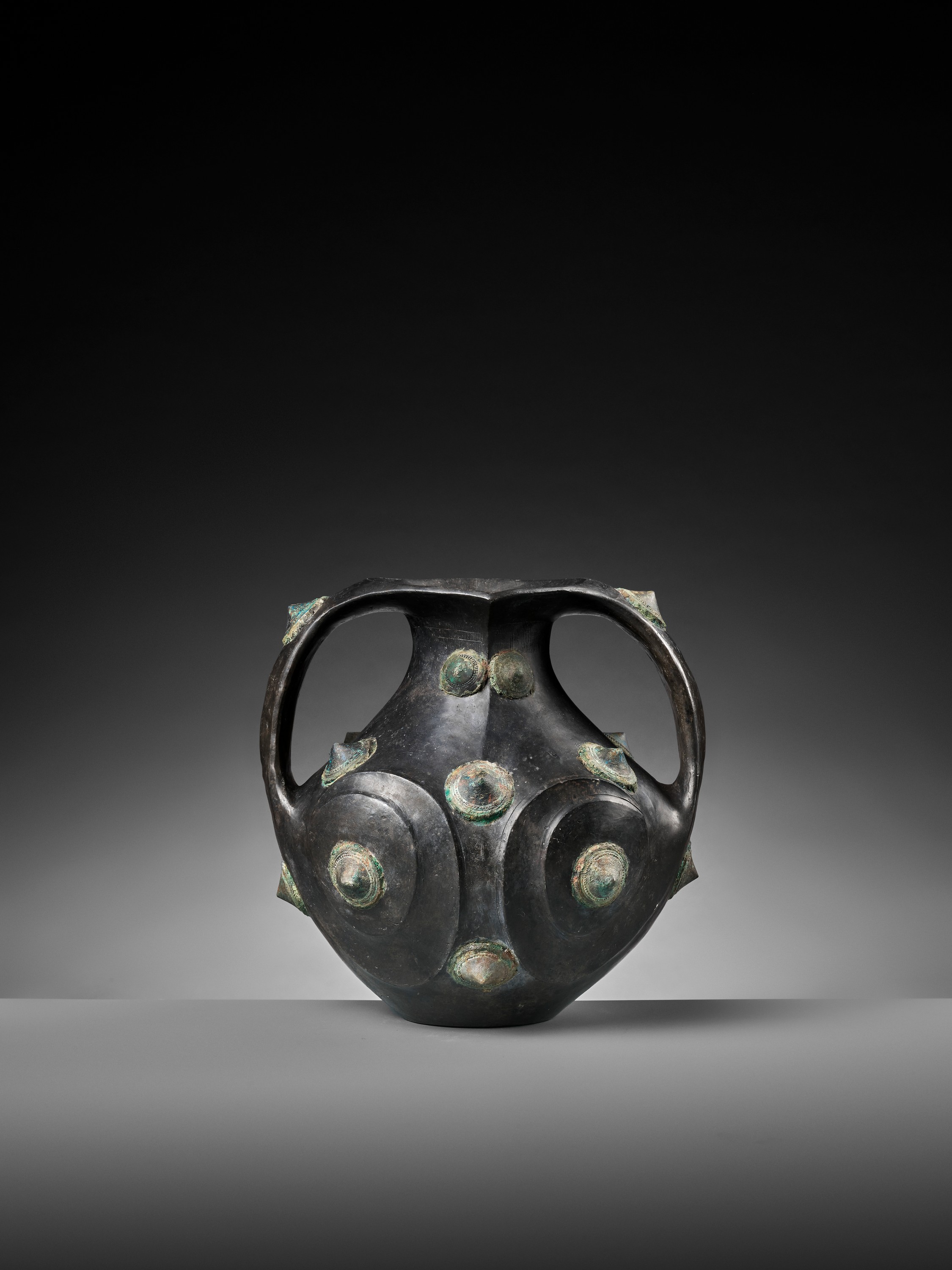Lot 138 - A BLACK POTTERY AMPHORA WITH APPLIED BRONZE