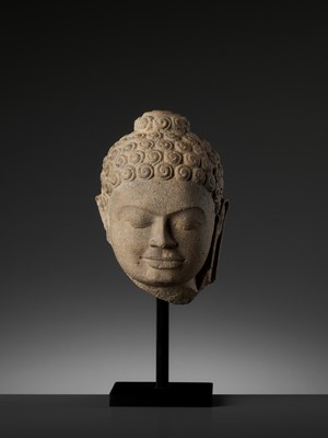 Lot 718 - A SANDSTONE HEAD OF BUDDHA, MON-DVARAVATI PERIOD