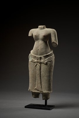 Lot 703 - A SANDSTONE TORSO OF UMA, ANGKOR WAT PERIOD, BAPHUON STYLE