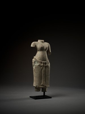Lot 703 - A SANDSTONE TORSO OF UMA, ANGKOR WAT PERIOD,