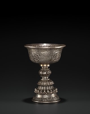 Lot 457 - A SILVER REPOUSSÉ BUTTER LAMP, 19TH CENTURY