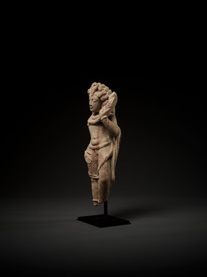 Lot 757 - A RARE RED SANDSTONE FIGURE OF NAGARAJA, THE SERPENT KING, 9TH-10TH CENTURY
