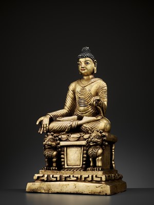 Lot 714 - A HEAVY GILT BRONZE ‘KASHMIR REVIVAL’ FIGURE OF BUDDHA SHAKYAMUNI, LATER 18TH- EARLIER 20TH CENTURY