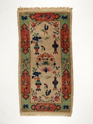 Lot 623 - A WOOL RUG, LATE QING TO REPUBLIC