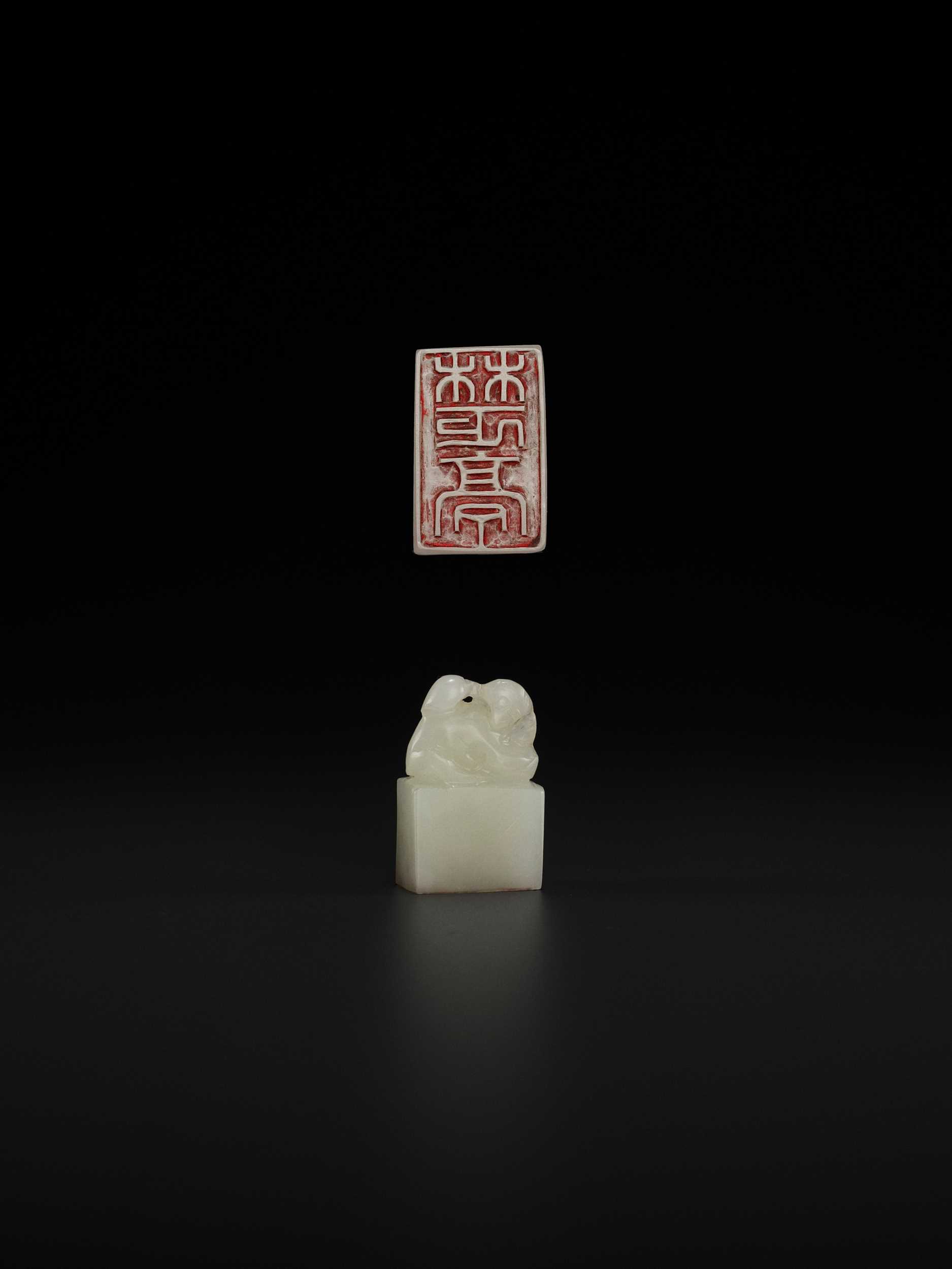 Lot 116 - A WHITE JADE ‘MONKEY AND PEACH’ SEAL, MID-QING TO REPUBLIC