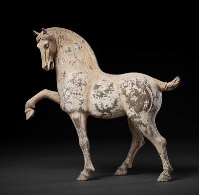 Lot 131 - A PAINTED POTTERY FIGURE OF A PRANCING HORSE, TANG DYNASTY