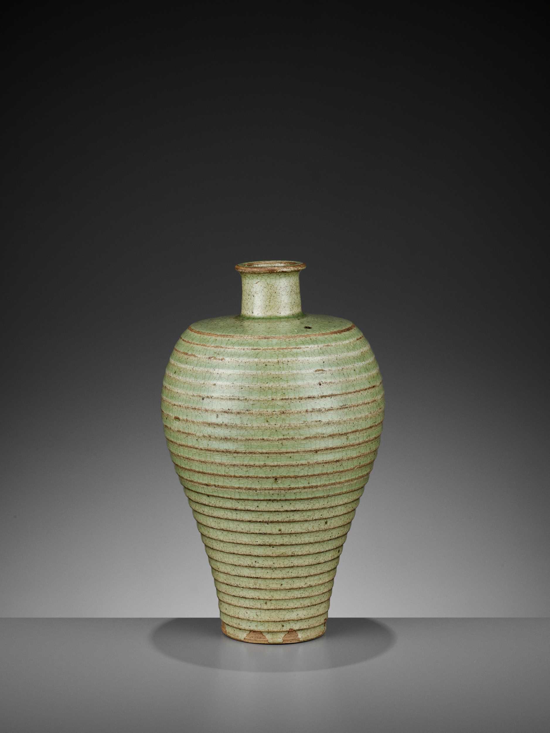 Lot 175 - A CELADON-GLAZED MEIPING, YUAN TO EARLY MING