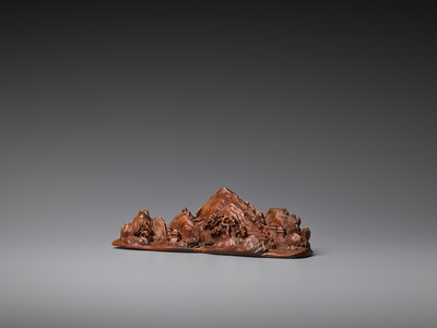 Lot 535 - A CARVED BOXWOOD ‘MOUNTAIN LANDSCAPE’ BRUSH REST, LATE QING TO REPUBLIC