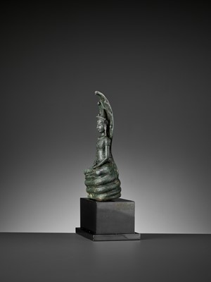 Lot 721 - A KHMER BRONZE FIGURE OF BUDDHA MUCHALINDA, LATE ANGKOR PERIOD