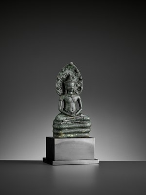 Lot 721 - A KHMER BRONZE FIGURE OF BUDDHA MUCHALINDA, LATE ANGKOR PERIOD