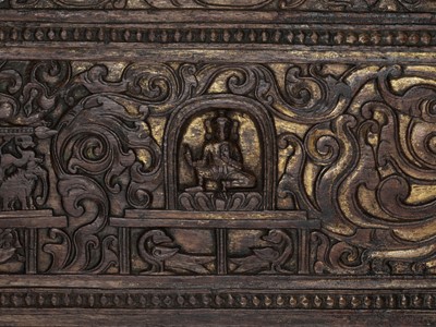 Lot 462 - A CARVED AND GILT HARDWOOD MANUSCRIPT COVER, 14TH-15TH CENTURY